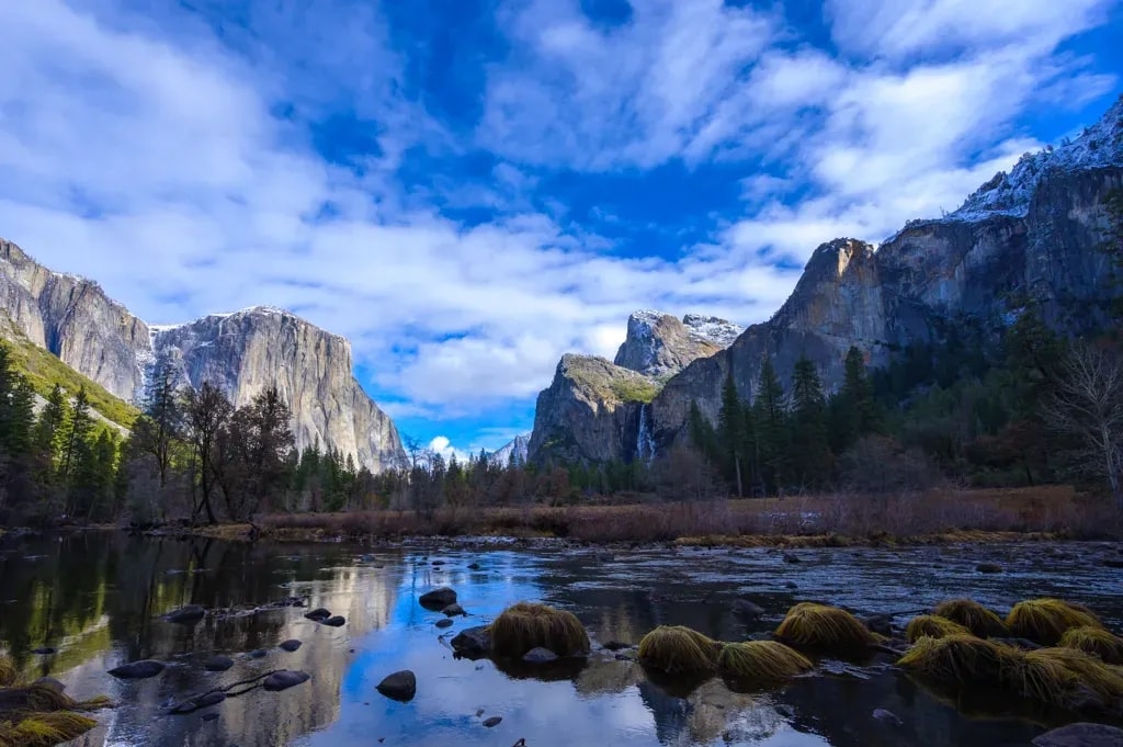El Capitan and Bridalveil Fall above the rocky Merced River at Valley View, Yosemite Valley