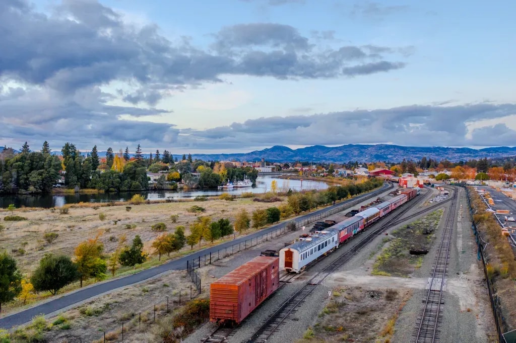Railroad tracks running beside the Napa River through California wine country